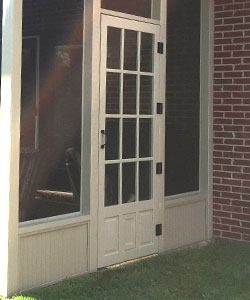 Model D829 Wood Screen Door with a Built In Dog Door Flap.