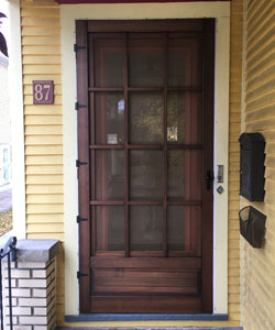 Old Fashioned Wood Screen Door in Cedar.  Screen Storm Door. Stained